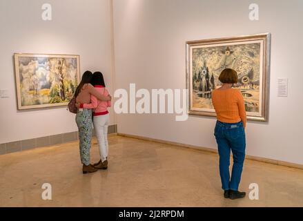 Visitors in American art room of Thyssen museum, Madrid