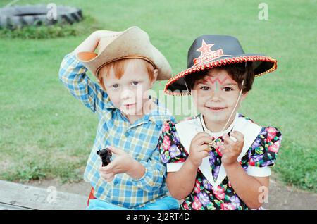 Golcar Nursery school children pictured during a Wild West fund day and barbecue, organised as a treat after they won a prize for their float at the Golcar gala, 2nd July 1992. Stock Photo