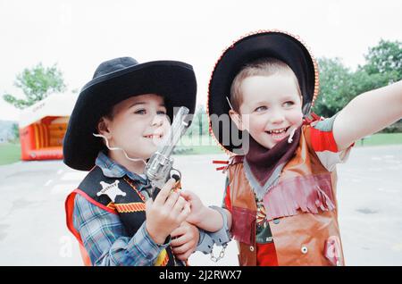 Golcar Nursery school children pictured during a Wild West fund day and barbecue, organised as a treat after they won a prize for their float at the Golcar gala, 2nd July 1992. Stock Photo