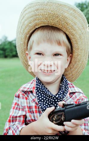 Golcar Nursery school children pictured during a Wild West fund day and barbecue, organised as a treat after they won a prize for their float at the Golcar gala, 2nd July 1992. Stock Photo