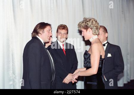 Princess Diana, HRH The Princess of Wales, attends the Royal Gala Premiere of '1492 - Conquest of Paradise' at The Empire Leicester Square, London. Picture shows The Princess talking with the star of the film, French actor Gerard Depardieu.  Picture taken 19th October 1992 Stock Photo