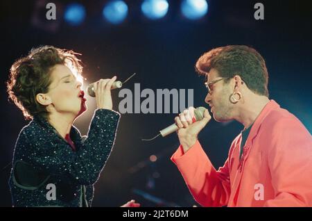 George Michael and Lisa Stansfield perform These Are The Days of Our Lives at The Freddie Mercury Tribute concert at Wembley Stadium in 1992. Picture taken Easter Monday 20th April 1992 Stock Photo