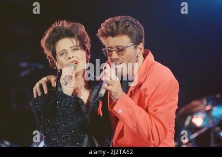 George Michael and Lisa Stansfield perform These Are The Days of Our Lives at The Freddie Mercury Tribute concert at Wembley Stadium in 1992. Picture taken Easter Monday 20th April 1992 Stock Photo