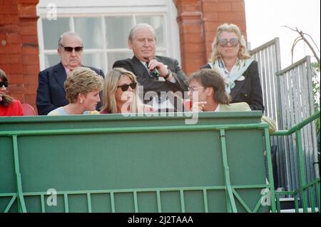 Cliff Richard joins Princess Diana in the royal box at the Stella Artois tennis Championships in West London. 13th June 1993. Stock Photo