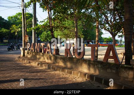 Red letters of the Pantai Kuta or Kuta Beach sign in Bali, Indonesia. Stock Photo