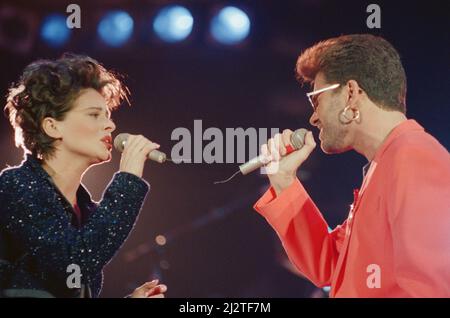 George Michael and Lisa Stansfield perform These Are The Days of Our Lives at The Freddie Mercury Tribute concert at Wembley Stadium in 1992. Picture taken Easter Monday 20th April 1992 Stock Photo