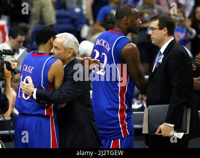 San Antonio, USA. 05th Apr, 2008. Kansas guard Jeremy Case receives a hug from North Carolina head coach Roy Williams after the Jayhawks defeated the Tar Heels 84-66, during a semi-final game in the NCAA Men's Basketball Championship Final Four at the Alamodome in San Antonio, Texas, Saturday, April 5, 2008. (Photo by Rich Sugg/Kansas City Star/TNS/Sipa USA) Credit: Sipa USA/Alamy Live News Stock Photo