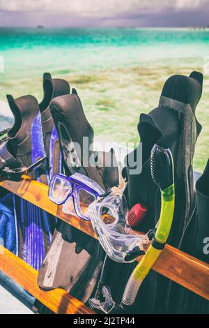 Snorkel fins and mask on cruise excursion snorkeling from boat in exotic ocean summer vacation travel holiday. Watersport activity Stock Photo