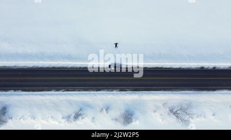 Man alone in the snow Stock Photo