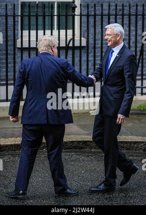London, UK, 14th March 2022. British PM Boris Johnson welcomes Latvian Prime Minister Arturs Krišjānis Kariņš to 10 Downing Street for talks, ahead of Stock Photo