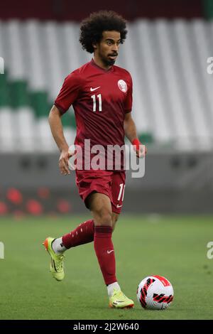 DOHA, QATAR - MARCH 29: Akram Hassan Afif of Qatar in possession during the international friendly match between Qatar and Slovenia at Education City Stadium on March 29, 2022 in Doha, Qatar. (Photo by MB Media) Stock Photo