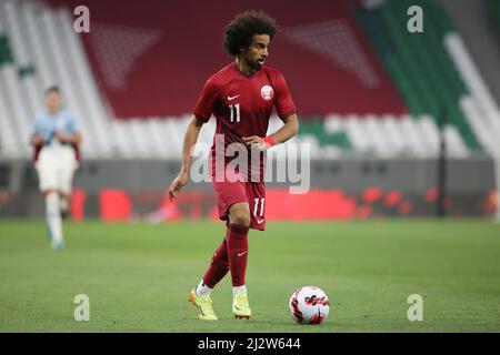 DOHA, QATAR - MARCH 29: Akram Hassan Afif of Qatar in possession during the international friendly match between Qatar and Slovenia at Education City Stadium on March 29, 2022 in Doha, Qatar. (Photo by MB Media) Stock Photo