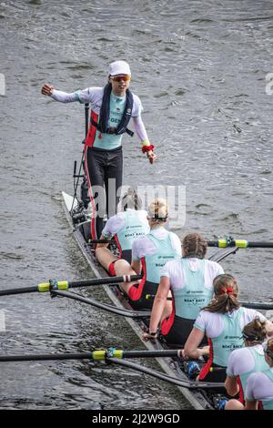 River Thames, London, UK. 3rd April, 2022. Cambridge cox Jasper Parish stood up at the finish of the The 76th WomenÕs Oxford v Cambridge Gemini Boat Race 2022. Credit: Jeff Gilbert/Alamy Live News Stock Photo