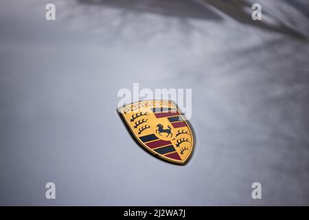 Slovenia, Ljubljana - March 15 2022: Porsche Logo Close up on a 911 Turbo S car Stock Photo