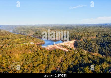 Flowing Warragamba river shut by a dam in Blue Mountains of Australia - spilling over. Stock Photo