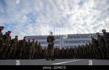 Chrudim, Czech Republic. 04th Apr, 2022. Czech soldiers are today, on Monday, April 4, 2022, leaving for Slovakia where they will command a multinational battlegroup that will be deployed there to boost the allied forces on the eastern flank of NATO in reaction to the situation in Ukraine. The battle group may have up to 2,100 members and soldiers from Germany, Poland, Slovenia, the Netherlands and the USA will be also part of it. Czechia will send several hundred soldiers to it. Credit: Josef Vostarek/CTK Photo/Alamy Live News Stock Photo