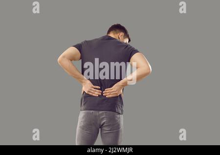 Unwell man suffer from lower backache Stock Photo