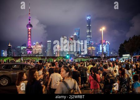 Crowds at night, The Bund, view of Pudong skyline, Shanghai, People&#39;s Republic of China, Asia Stock Photo