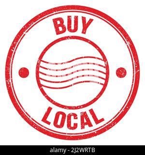 BUY LOCAL text written on red round postal stamp sign Stock Photo