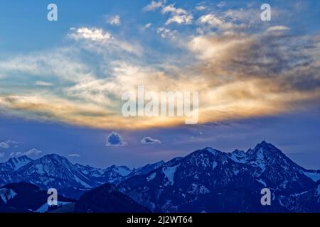 Evening cloud mood over the Spitzing area and Wendelstein, from the Heuberg, Chiemgau Alps, Upper Bavaria, Bavaria, Germany Stock Photo