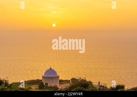 Sunset view of The Holy Family Chapel, and the Mediterranean Sea, on Mount Carmel, Haifa, Northern Israel Stock Photo