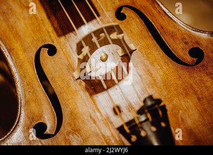 Close up of wooden, detail violin instrument in a philharmonic Stock Photo