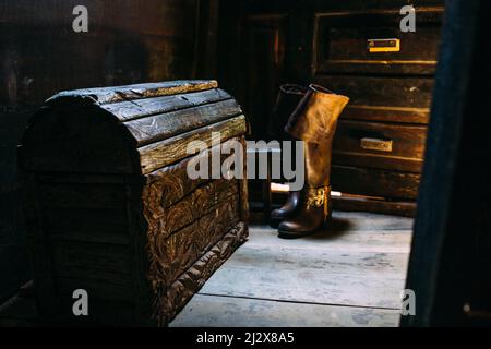 Wooden winch of a sailing ship and ropes on the deck of medieval pirate warship Stock Photo