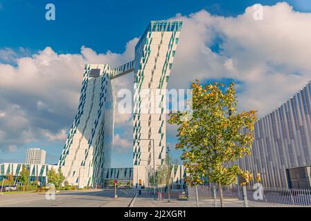 Two towers of modern AC Hotel Bella Sky and Bella exhibition and conference Center in the Ørestad district of Copenhagen, Denmark Stock Photo