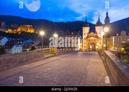 Heidelberg, view from Alter Brücke on the bridge gate, old town, Heiliggeistkirche and castle Stock Photo