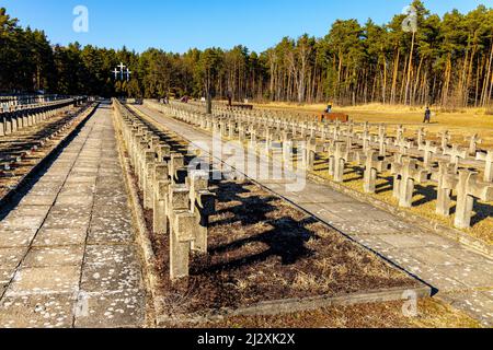 Palmiry, Poland - March 20, 2022: Historic cemetery of World War II victims from Warsaw and Mazovia executed by Hitler Nazis executed in Palmiry fores Stock Photo