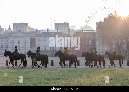 Horses marching along Horse Guards parade this morning.  Images shot on the 24th March 2022.  © Belinda Jiao   jiao.bilin@gmail.com 07598931257 Stock Photo