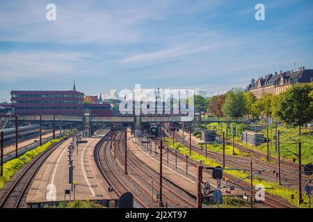 Railoads and pedestrian bridge on Østerport main line railway station in Copenhagen, Denmark. Stock Photo