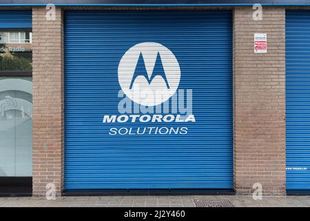 VALENCIA, SPAIN - MARCH 28, 2022: Motorola Solutions is an American telecommunications equipment, software, systems and services provider Stock Photo