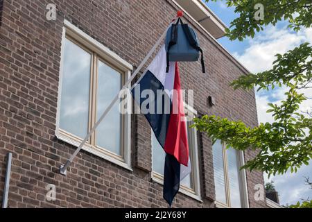 A Dutch Tradition For Passing School Exams A Schoolbag On A Flag At Diemen The Netherlands 8-6-2022 Stock Photo