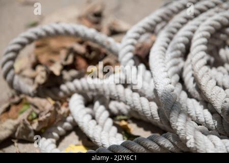Closeup shot of a tight white rope in Juan Lacaze, Uruguay Stock Photo