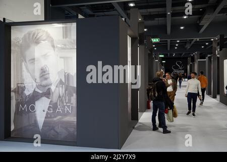 MILAN, ITALY - APRIL 3, 2022: Stands and visitors at Si Sposaitalia Collezioni fair during Milan Bridal Week Stock Photo