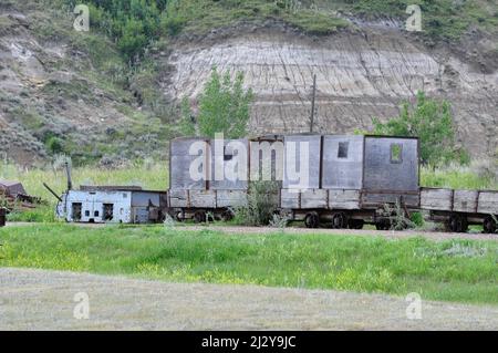 Carts use to transport men, equipment and coal out of the mine. Atlas Coal Mine, National Historic Site of Canada, East Coulee, Alberta, Canada, Augus Stock Photo