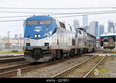 Seattle - April 03, 2022; The Amtrak Coast Starlight long distance passenger service departs Seattle bound for Los Angeles Stock Photo