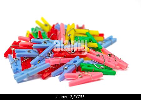 Colorful clothespins against white background Stock Photo