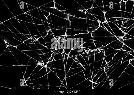 The effect of broken glass screen smartphone, cracked on a black background Stock Photo