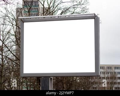Blank billboard mockup as copy space for testing advertisements. Empty white screen to display banner ads. Template for a promotion campaign. Stock Photo