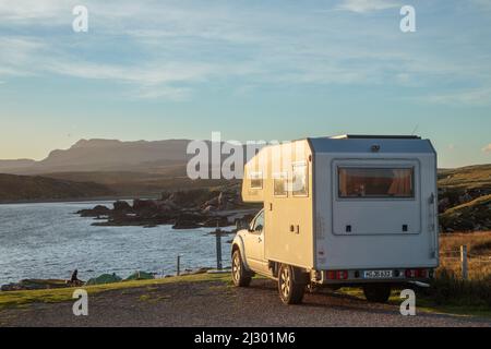 Camper, motorhome, parking space, four wheel drive bimobile, Summer Isles, Scotland UK Stock Photo