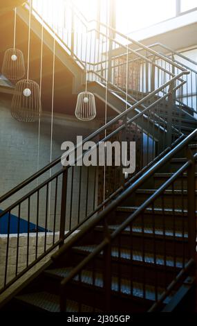 The stairway to success. Shot of a staircase in a building. Stock Photo