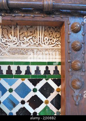 A  closeup shot of an ornament vintage design of a gate with wooden metal frame Stock Photo