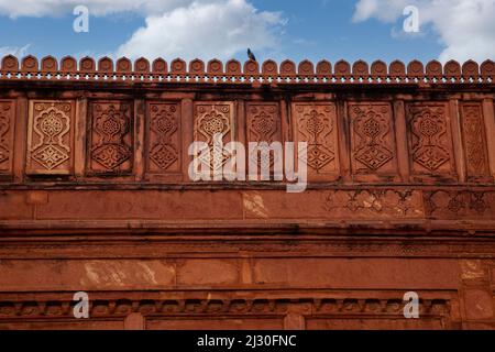 Agra, India.  Agra Fort, Jahangiri Mahal.  Stonecarving along Roof Line. Stock Photo