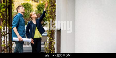real estate agent and appraiser doing house inspection. property appraisal. copy space Stock Photo