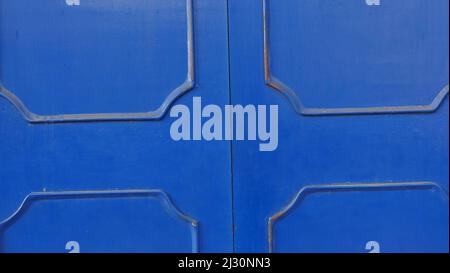 A blue, metal gate background with rectangular patterns Stock Photo