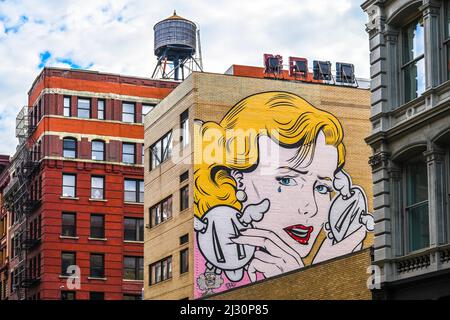 large painted mural on a building in Soho neighborhood in New York City Stock Photo