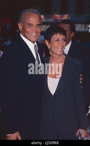 Harry Belafonte and wife Julie Robinson attend the premiere of 'Kansas' at Sony Lincoln Square in New York City on August 5, 1996.  Photo Credit: Henry McGee/MediaPunch Stock Photo