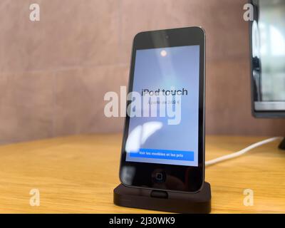 Paris, France - Mar 18, 2022: Hero object of latest iPod music player product displayed in Apple Store as the device by Apple Computers goes on sale Stock Photo